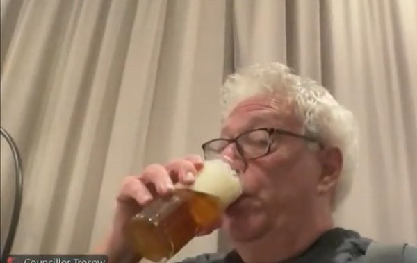 Bottoms up! Ontario councillor under fire for drinking beer during meeting