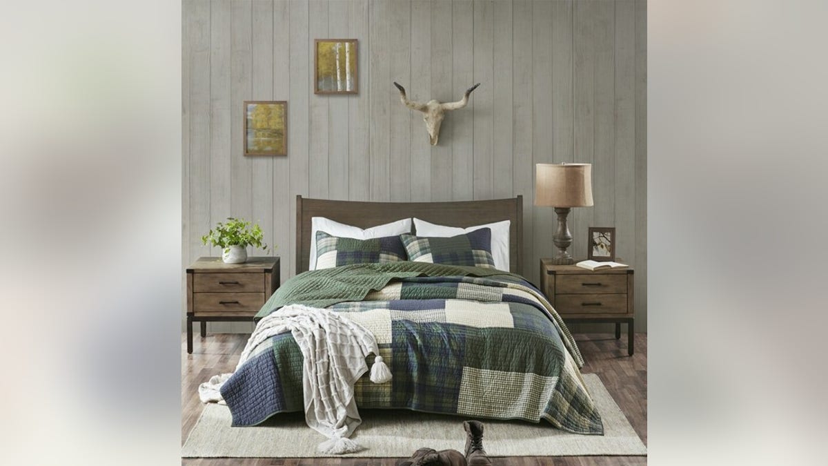 Decorate your bed with a heavy quilt that also traps heat.