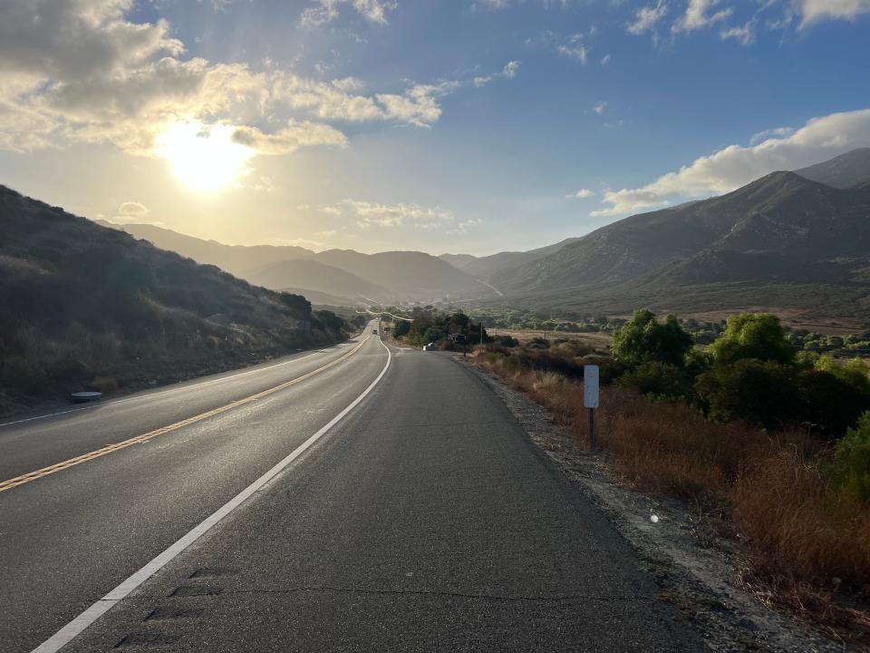 The sun rises over California Highway 94, east of San Diego, near the hamlet of Dulzura