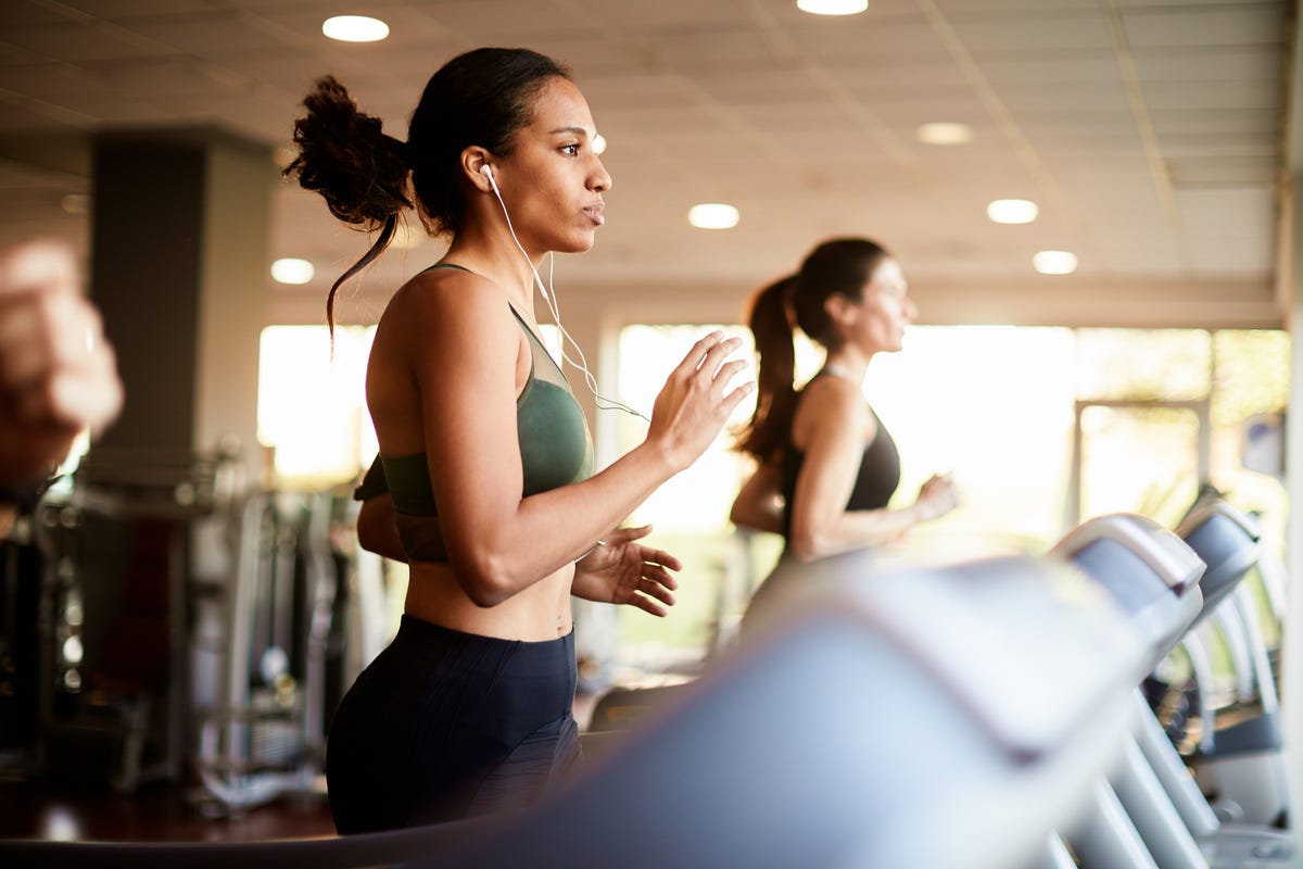woman running on treadmill