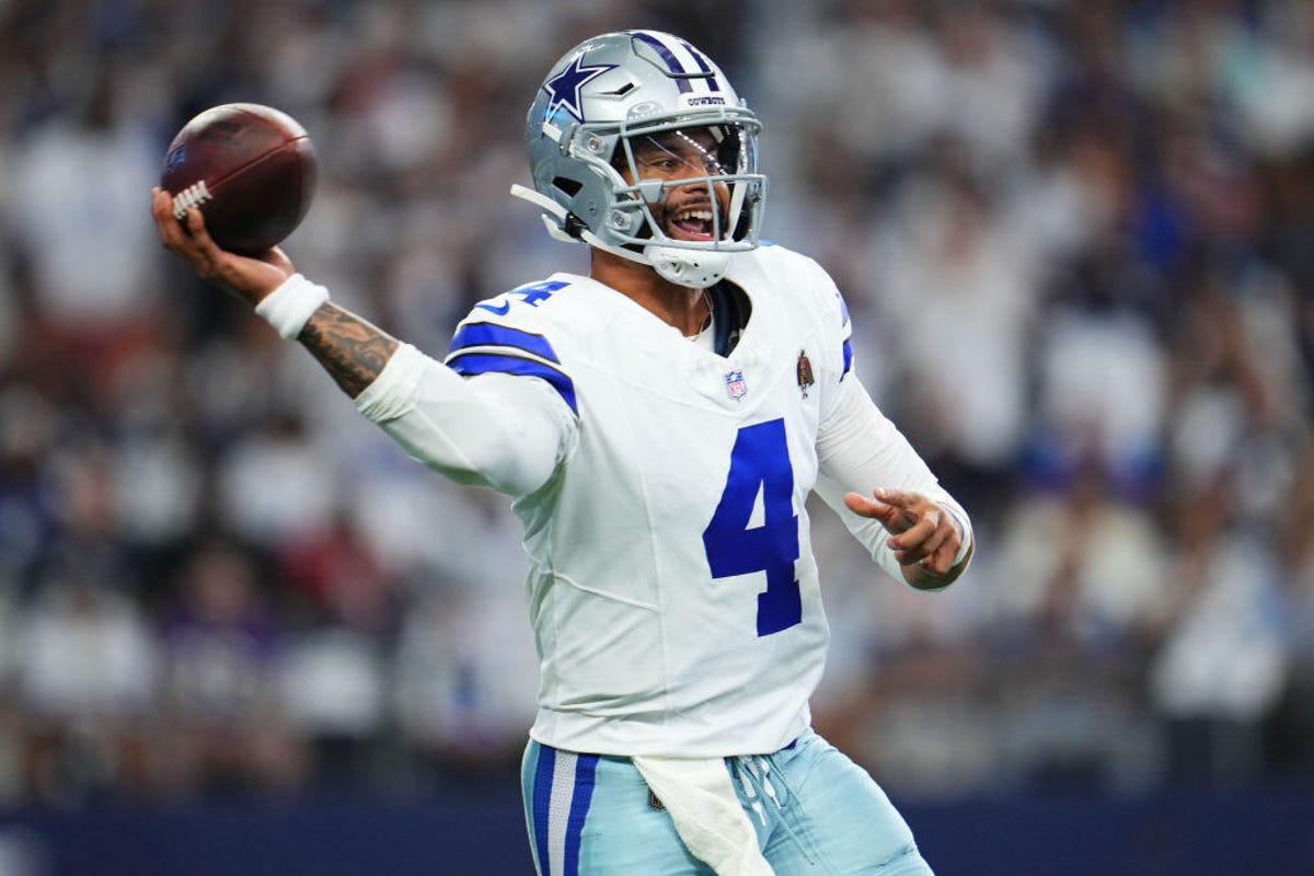 Dak Prescott #4 of the Dallas Cowboys passes against the Baltimore Ravens during the first half of an NFL football game at AT&T Stadium