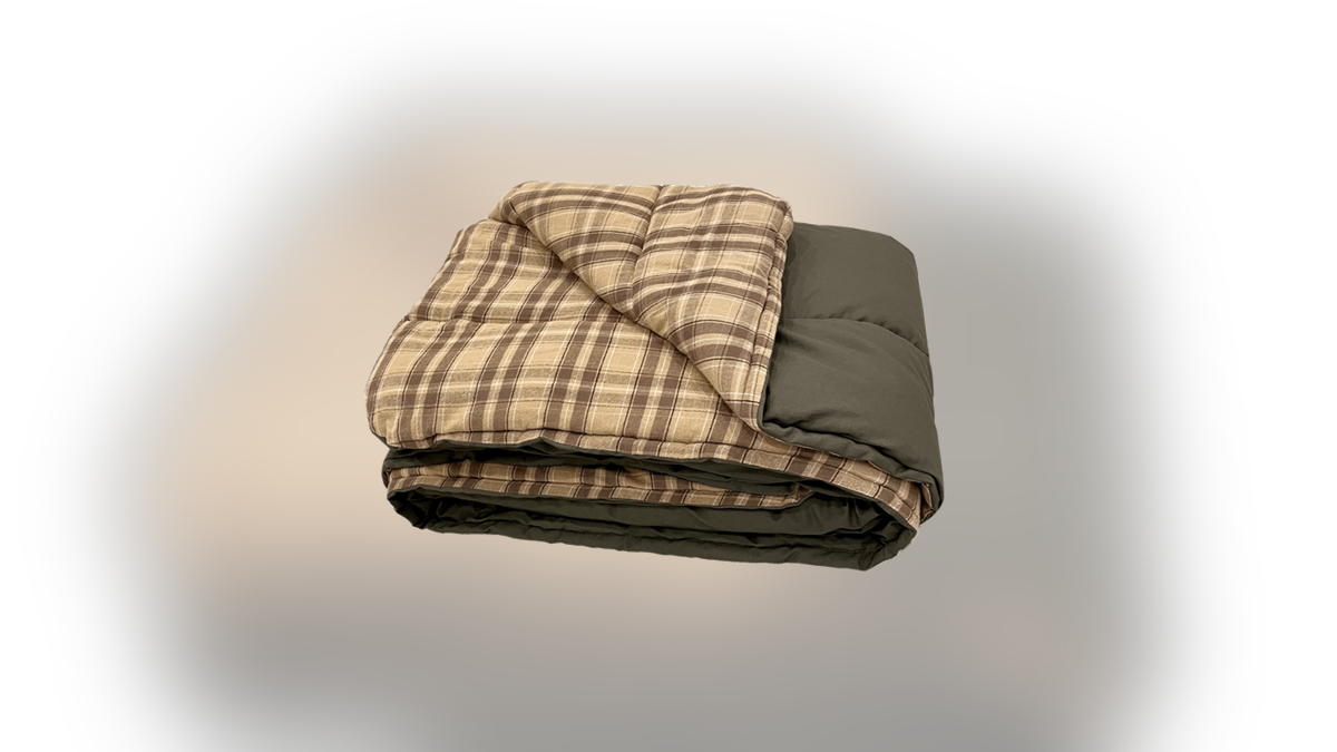 Stay dry and warm with a canvas camping blanket.