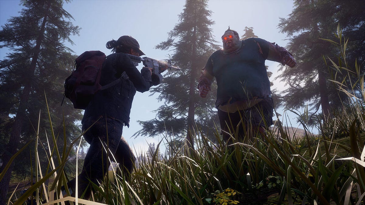 A person aiming a gun at a giant zombie with red eyes