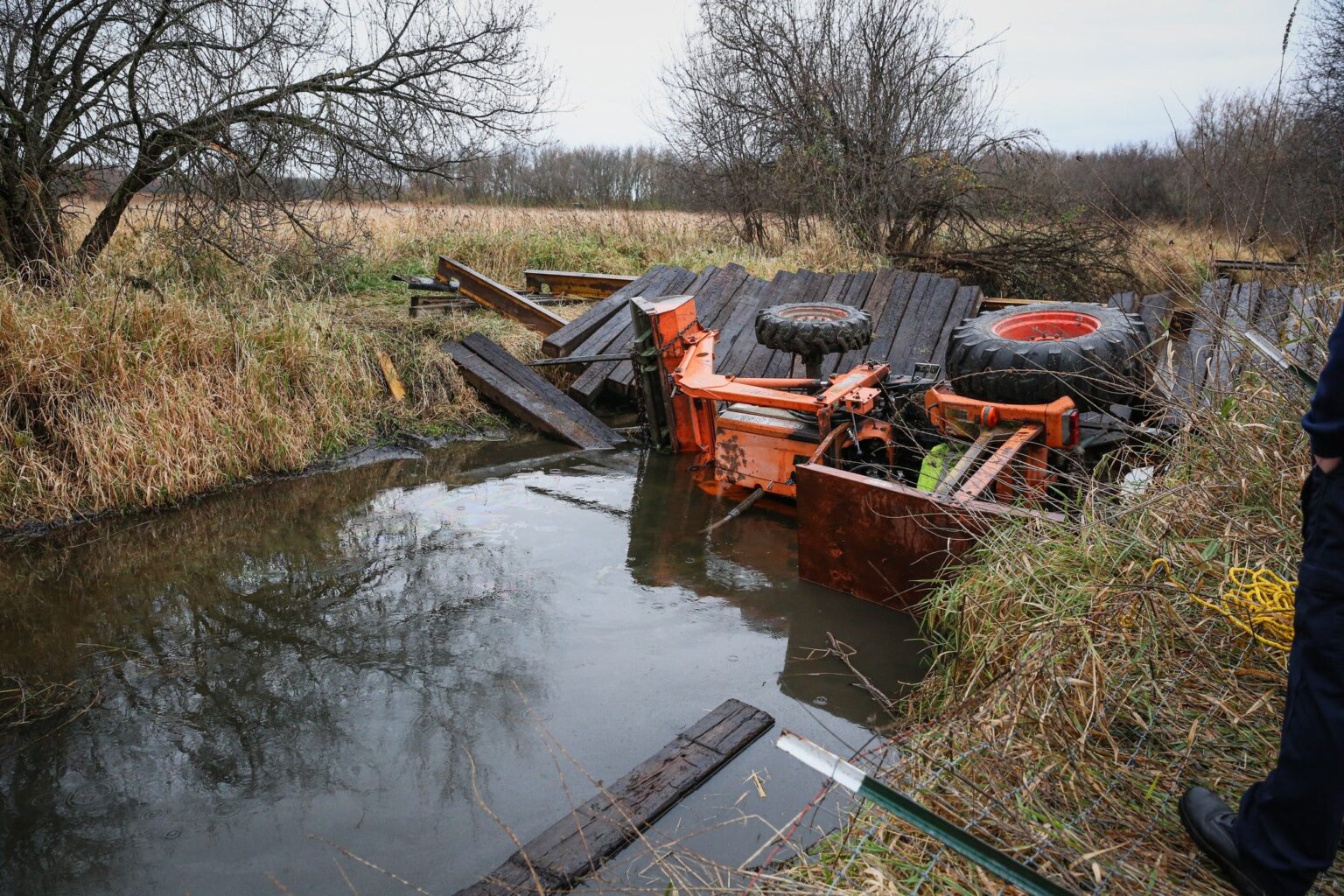 Illinois man rescued after bridge collapse causes tractor to trap him in creek