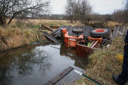 Illinois man rescued after bridge collapse causes tractor to trap him in creek