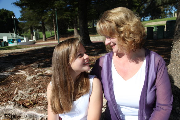 Molly Wilkes as a child with her mother Julie Adams.