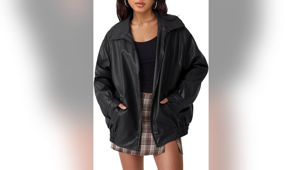 An oversized leather jacket keeps you warm and looking cool.