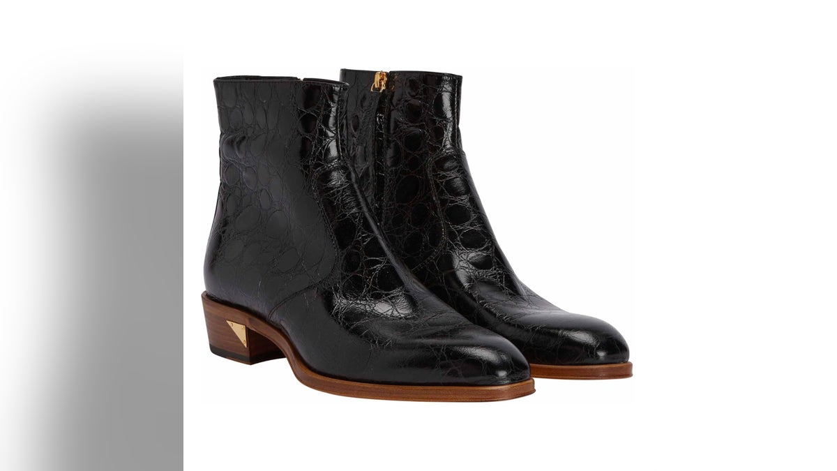 Pair these high-end leather boots with all your cocktail attire.