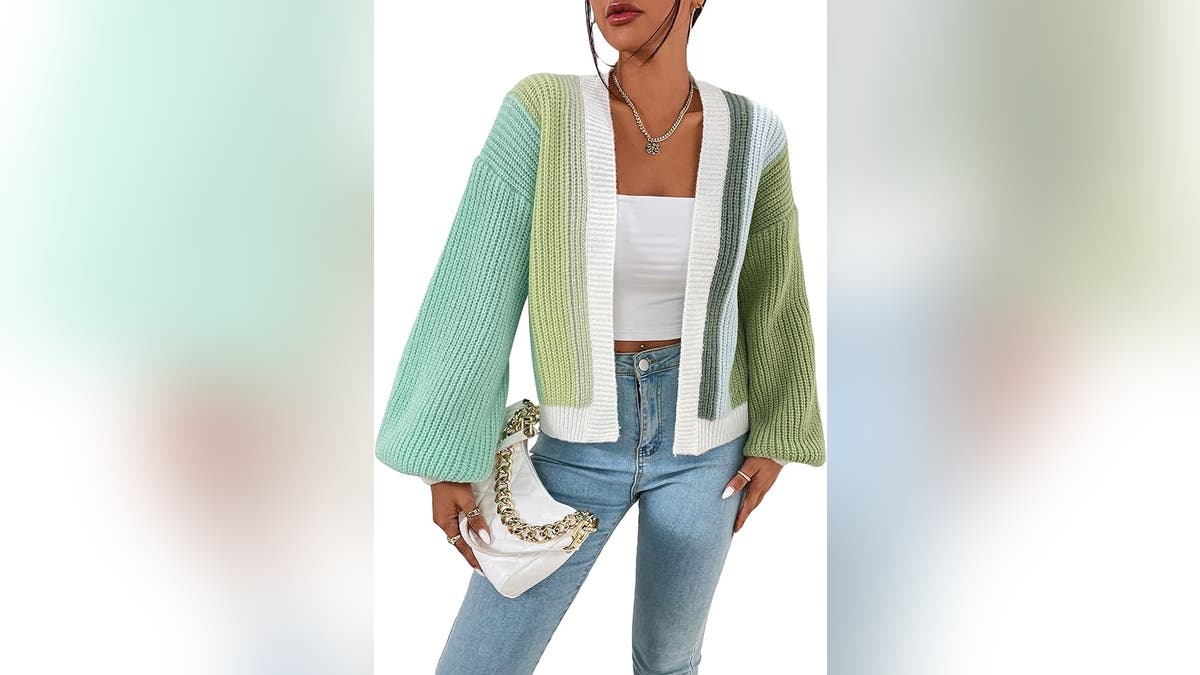 This cute cardigan is soft and stretchy.