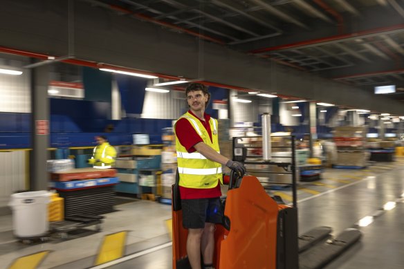 Worker at Coles’ customer fulfilment centre, which dispatches next-day online delivery orders across greater Melbourne.