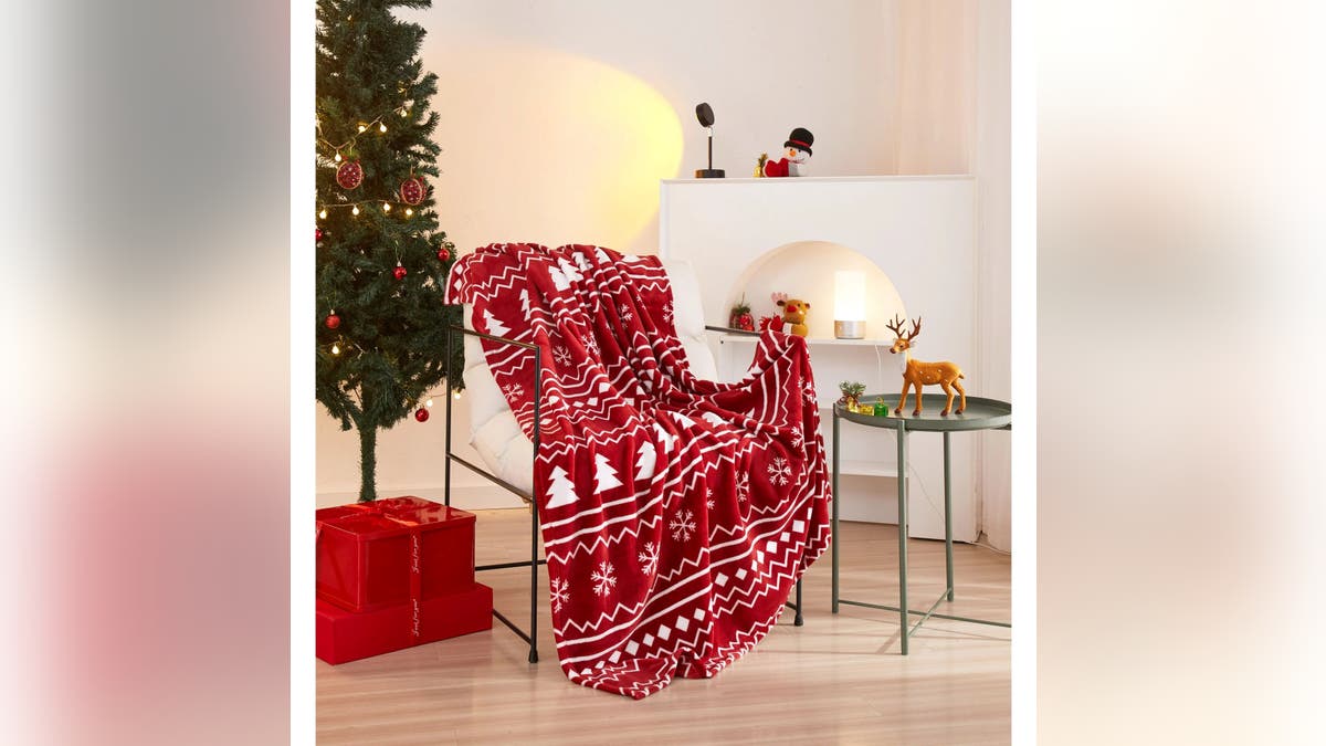 Stay cozy under this festive blanket.