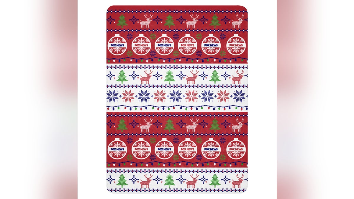 Stay warm and cozy with this super soft Christmas blanket.