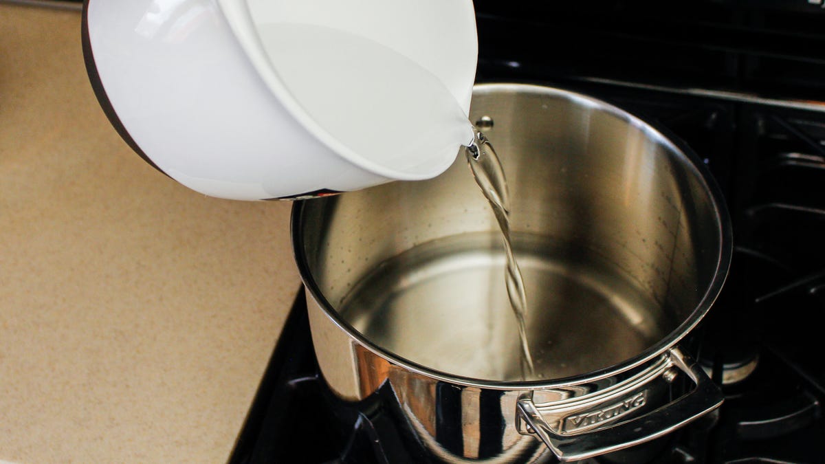 water being poured into pot