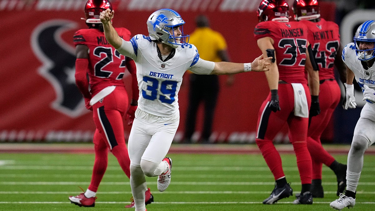 Jake Bates runs off the field