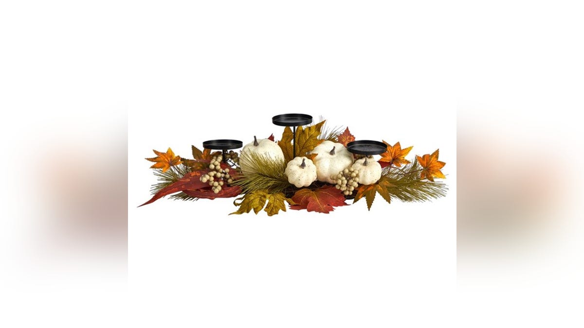 Pumpkins and leaves make for an ideal Thanksgiving centerpiece.
