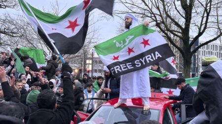 Germany and Austria freeze Syrian asylum applications, local media report