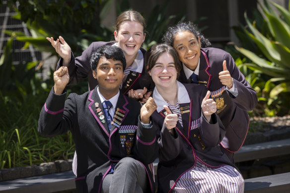 Mixing extracurricular activities was the secret to success for Haileybury’s high-achievers Jaeden Vaithainathan, 17, Lucy Gibson, 18, (sitting) and Ashleigh Bell, 18, and Sandy Aurora, 17.