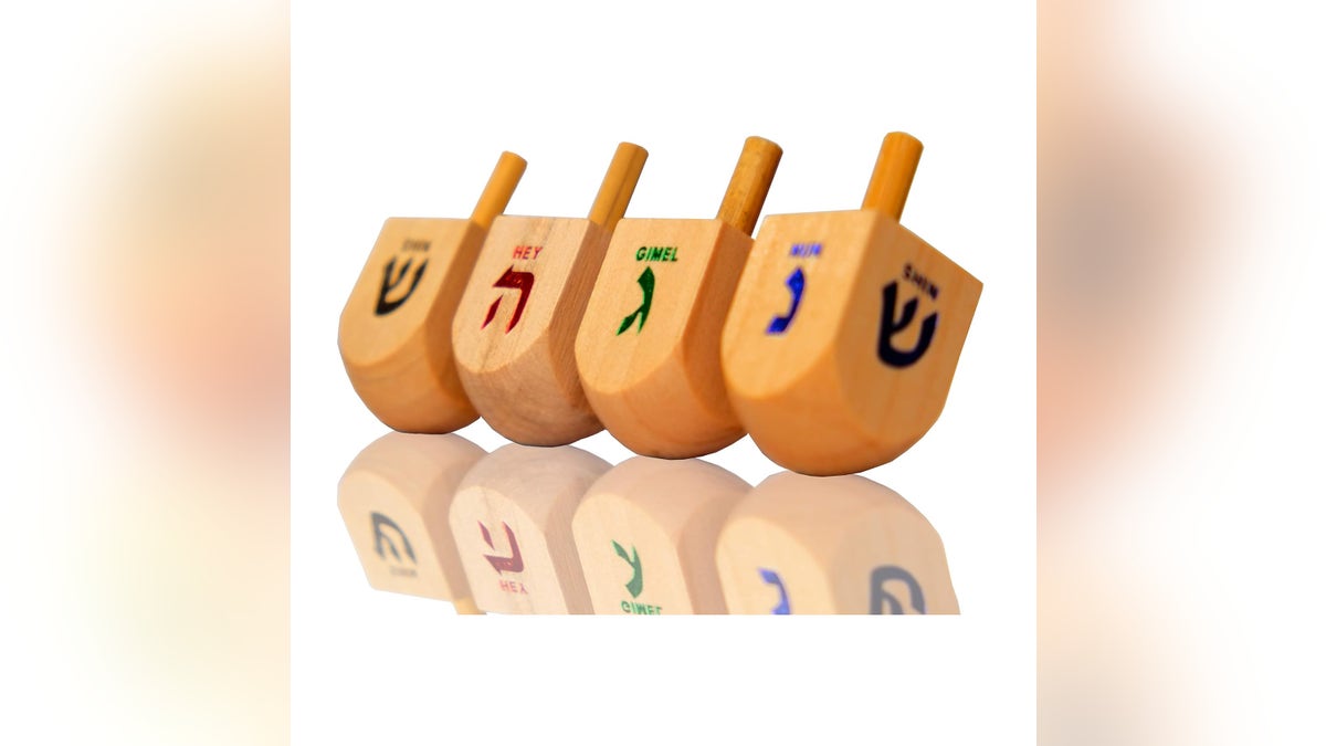 Dreidel is a classic game families play on Hanukkah.