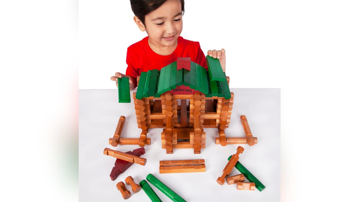 Lincoln Logs are a time-tested toy that teaches motor skills.