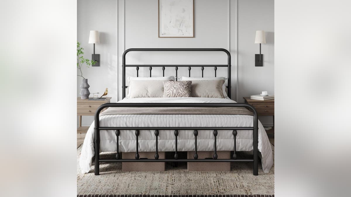 A farmhouse-style bed frame makes a great centerpiece for your bedroom.