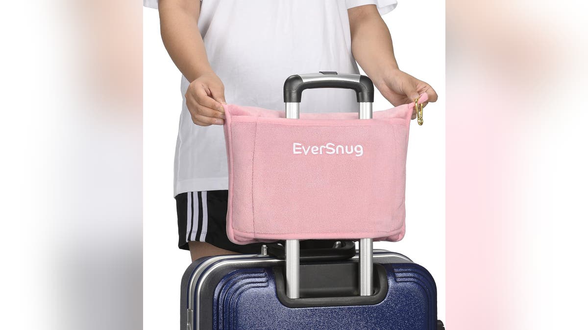 Get a travel blanket and pillow all in one. 