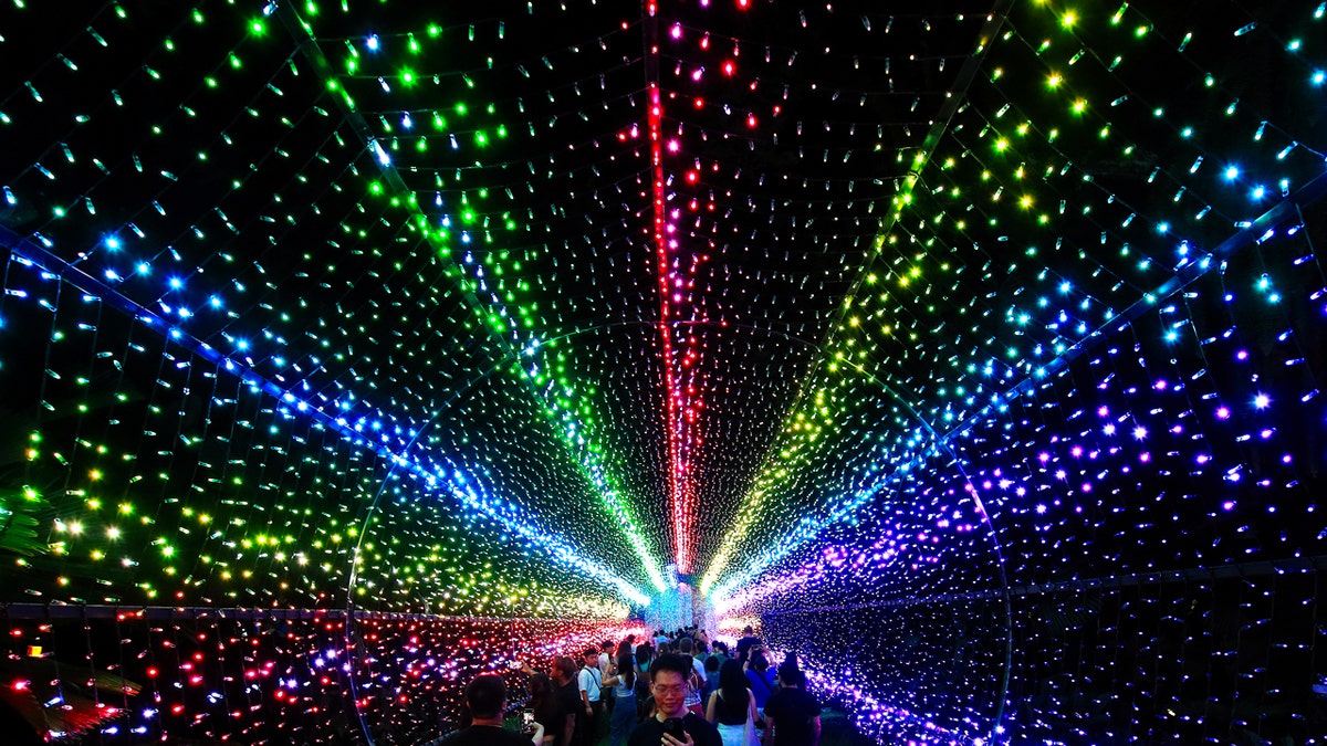Colorful lights in a tunnel at Christmas Wonderland in Singapore