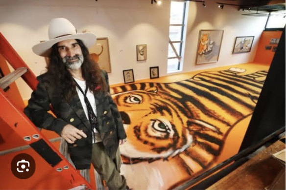 Mills with his new exhibition at FORM Gallery. 