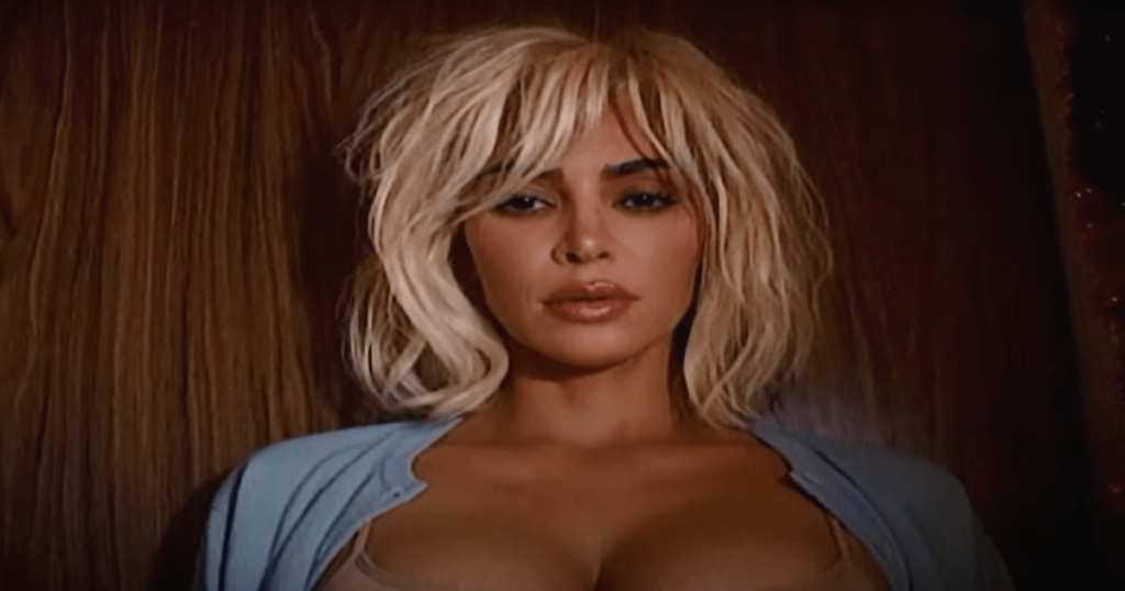 Kim Kardashian Releases ‘Santa Baby’ Cover Produced by Brother-in-Law Travis Barker