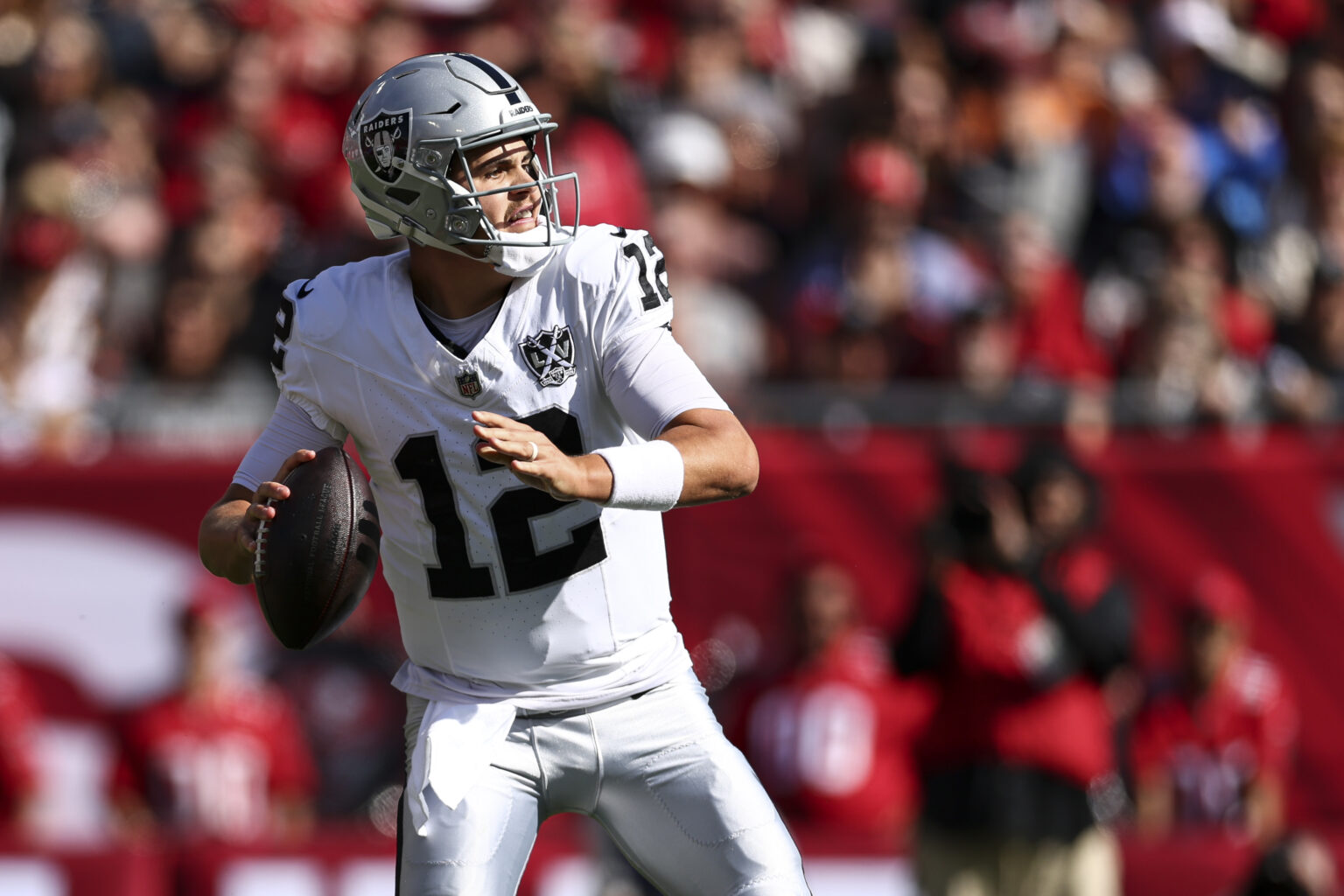 Raiders QB Aidan O’Connell Carted Off Field With Air Cast Following Massive Hit