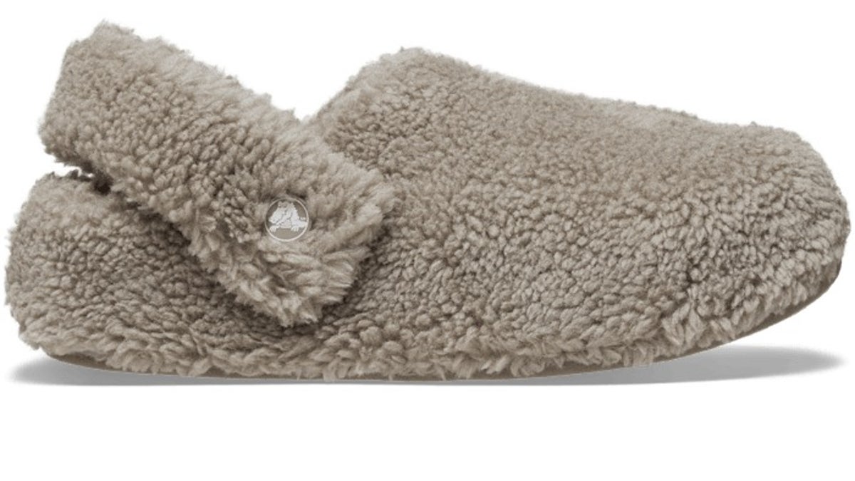Fuzzy slippers from UGG offer a trendy, playful aesthetic.