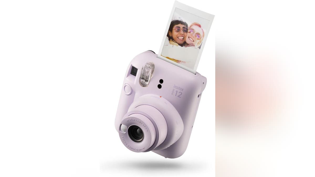 Print photos instantly with this retro Polaroid camera.