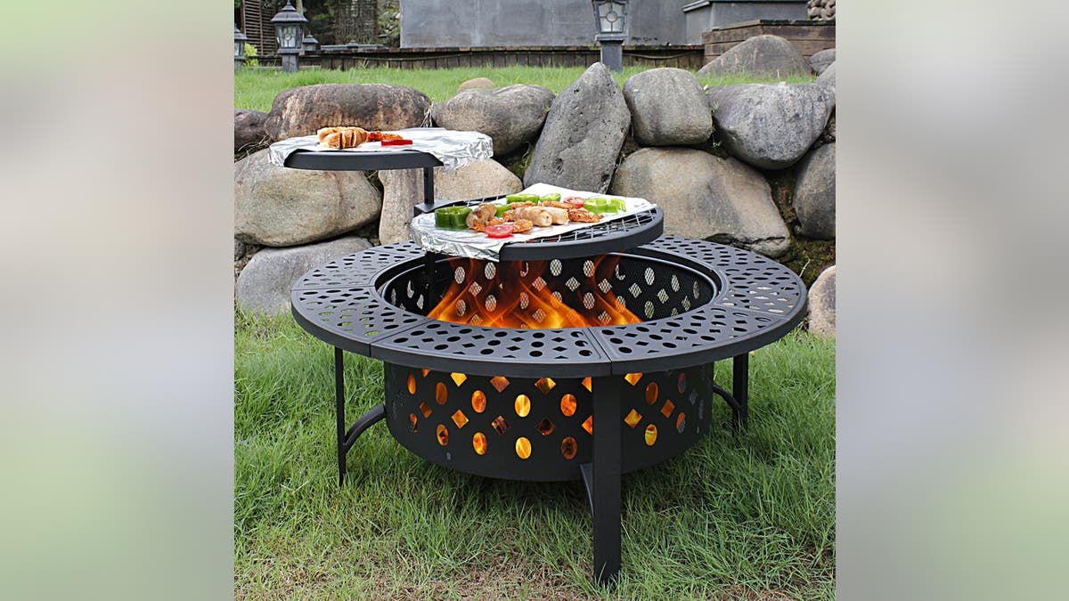 Cook all your meals over an open fire with this fire pit setup.