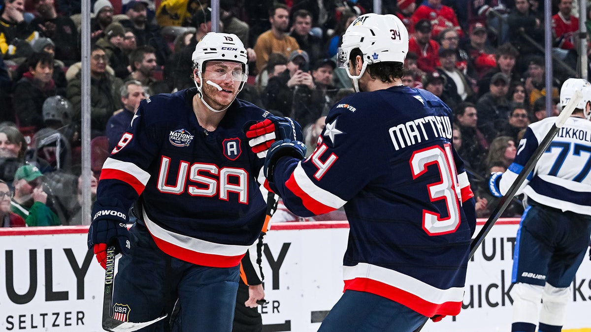Matthew Tkachuk celebrates with Auston Matthews