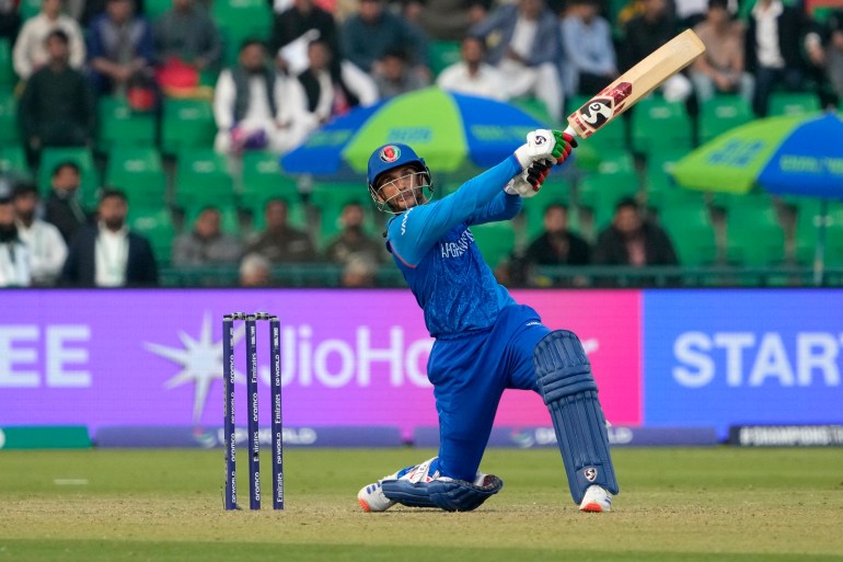 Afghanistan's Azmatullah Omarzai bats during the ICC Champions Trophy cricket match between Australia and Afghanistan, in Lahore, Pakistan, Friday, Feb. 28, 2025. (AP Photo/K.M. Chaudary)