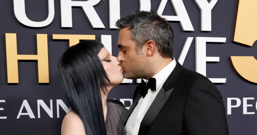 Lady Gaga and Fiance Michael Polansky Share Sweet Kiss in Rare PDA Moment at ‘SNL 50’