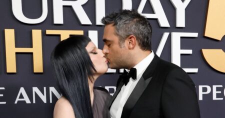 Lady Gaga and Fiance Michael Polansky Share Sweet Kiss in Rare PDA Moment at ‘SNL 50’