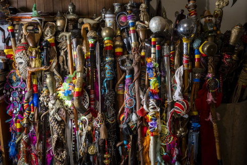 Some of the hundreds of decorated staffs made by Baba Desi.