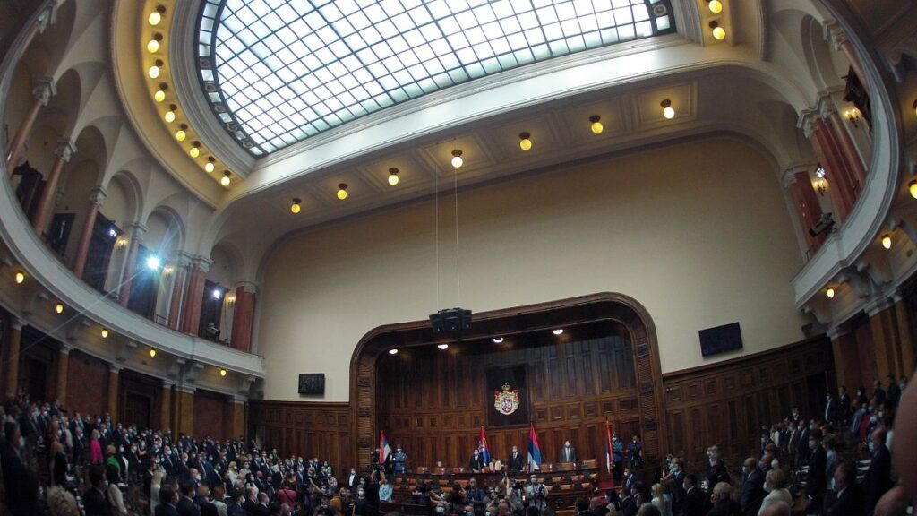 Serbia's parliament erupts into chaos as opposition MPs set off flares