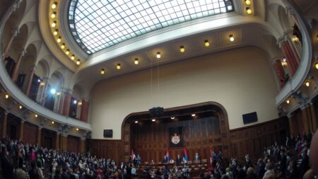 Serbia's parliament erupts into chaos as opposition MPs set off flares