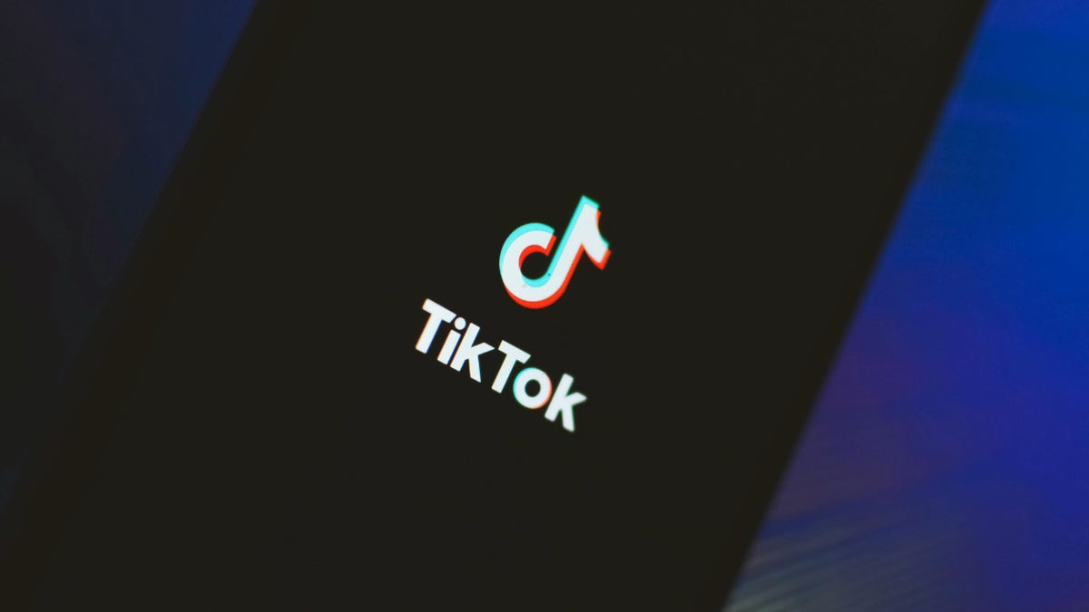 TikTok logo on a smartphone