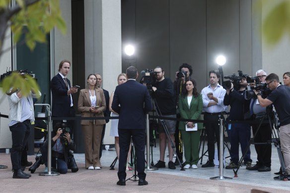 Chalmers speaking to the media.