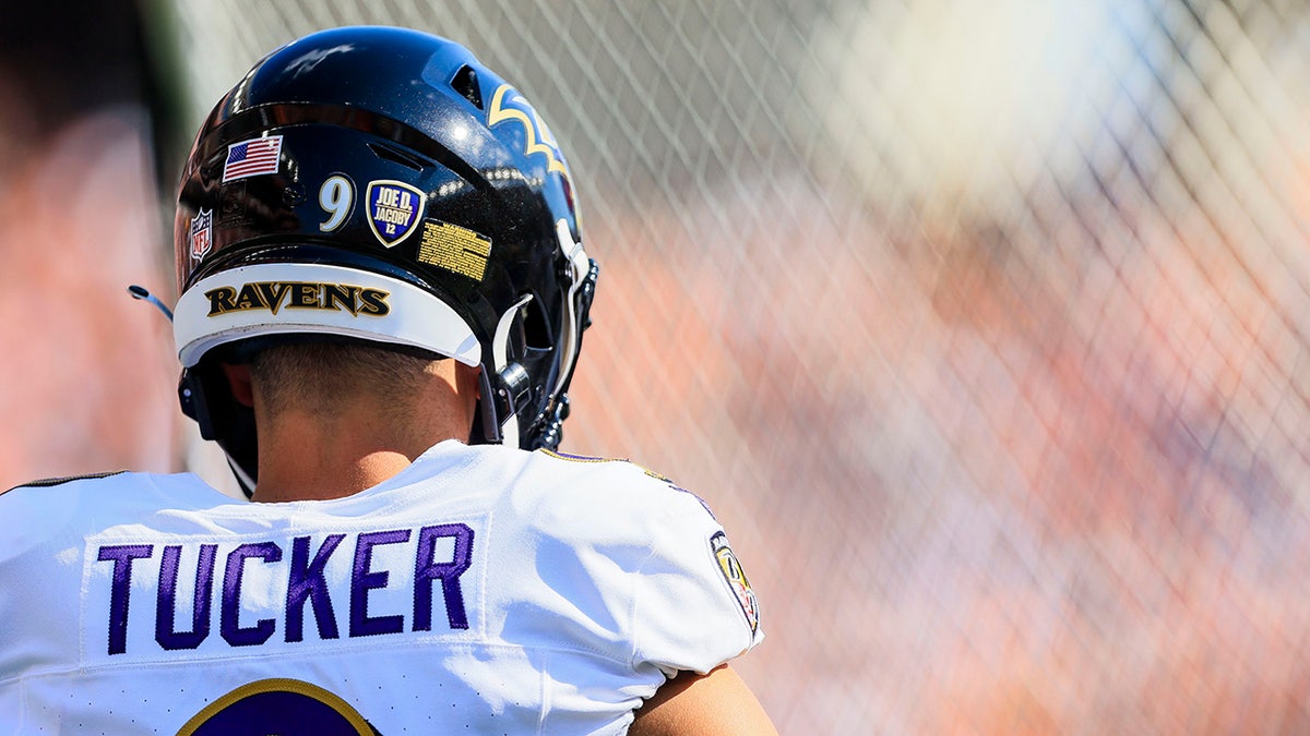 Justin Tucker looks on
