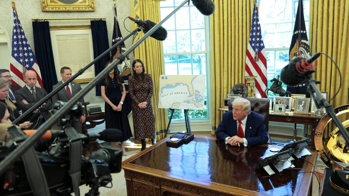 WASHINGTON, DC - APRIL 09: U.S. President Donald Trump speaks to reporters as he signs executive orders in the Oval Office of the White House on April 09, 2025 in Washington, DC. President Trump signed several executive orders including directing the