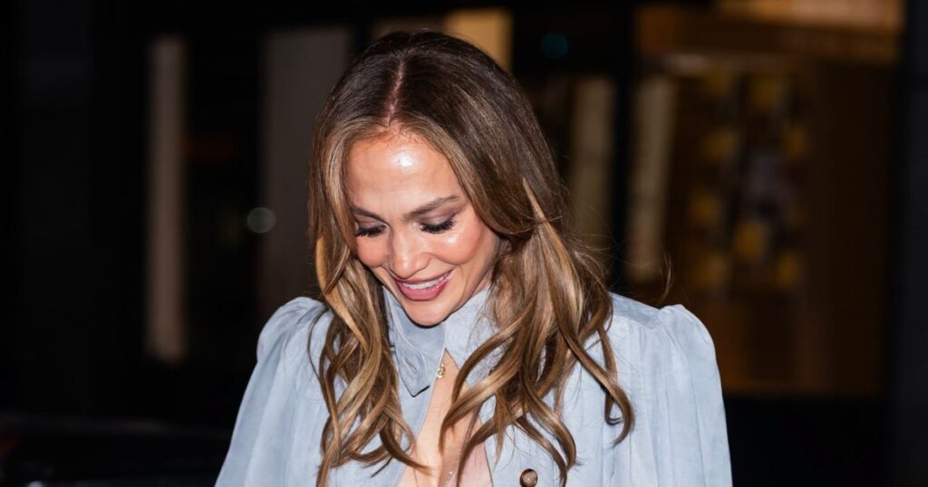 Jennifer Lopez Teases a Glimpse of Her Lingerie in Sexy Sheer Top