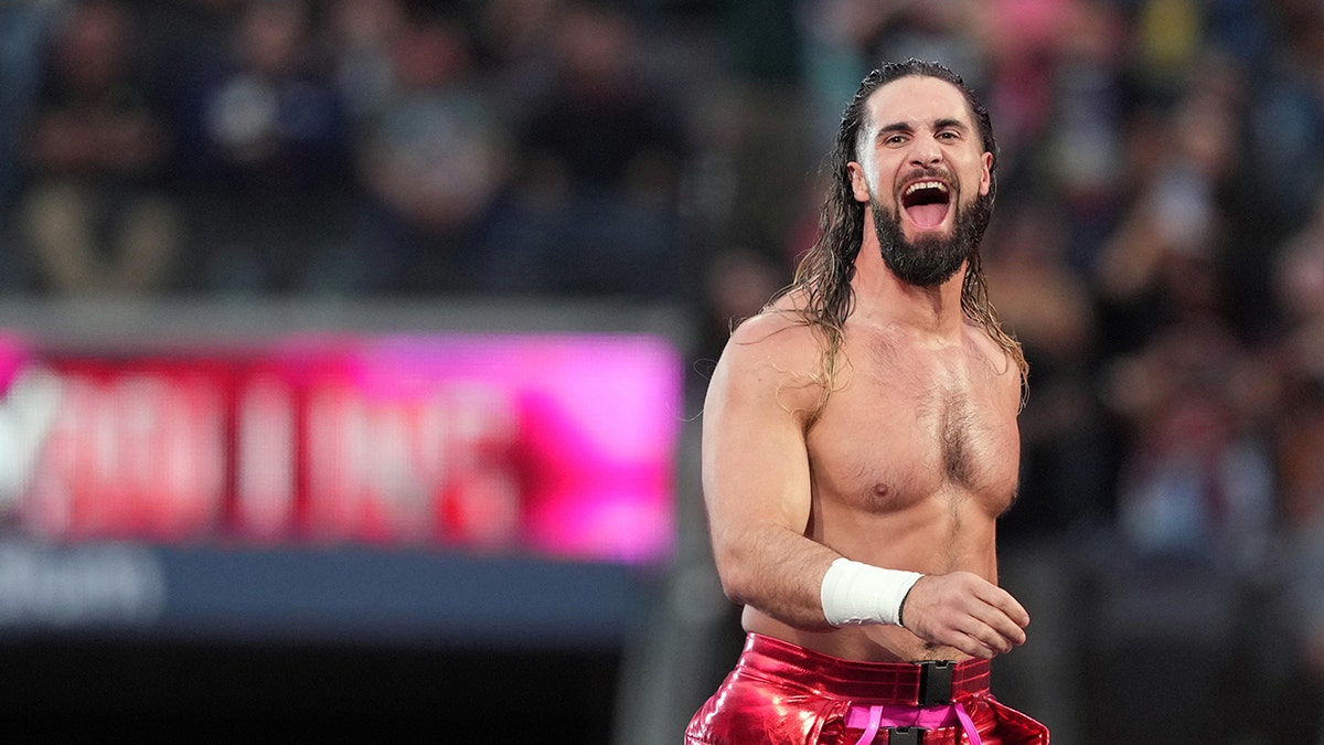 Seth Rollins walks to the ring