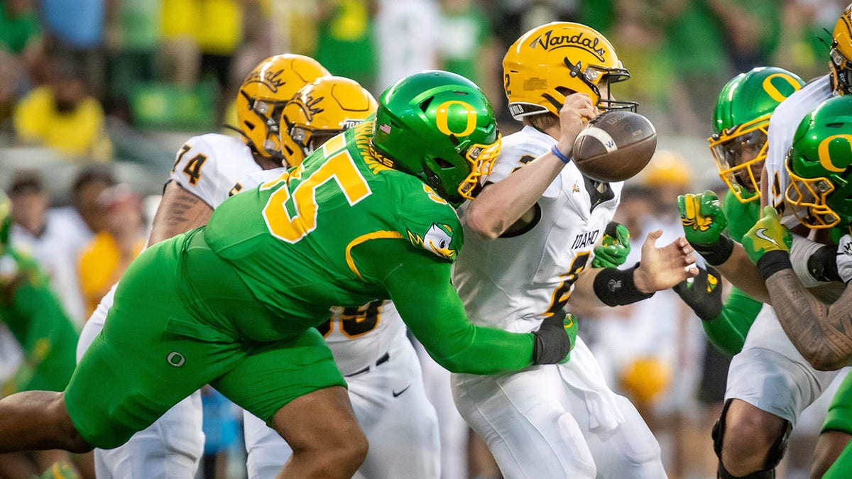 Derrick Harmon forces a fumble