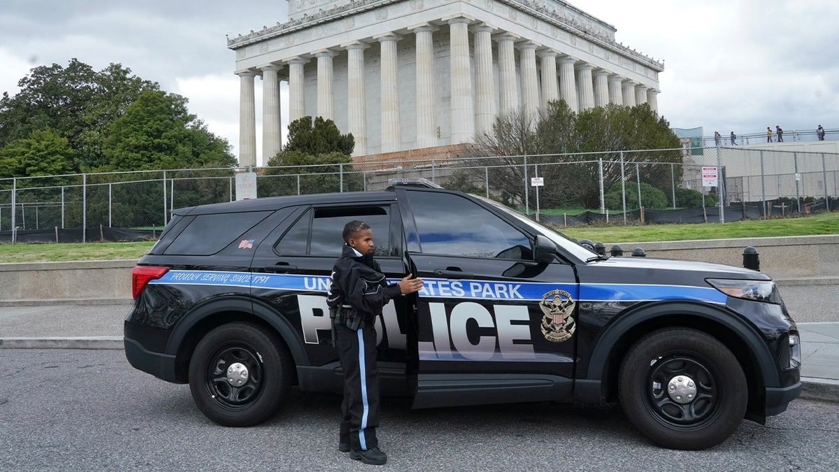 DJ Daniel with Park Police patrol car