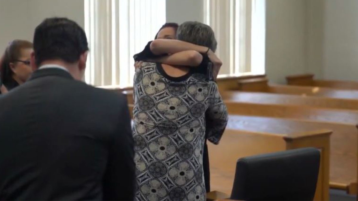 Kaila Nix-Schock and Tracey Nix hug