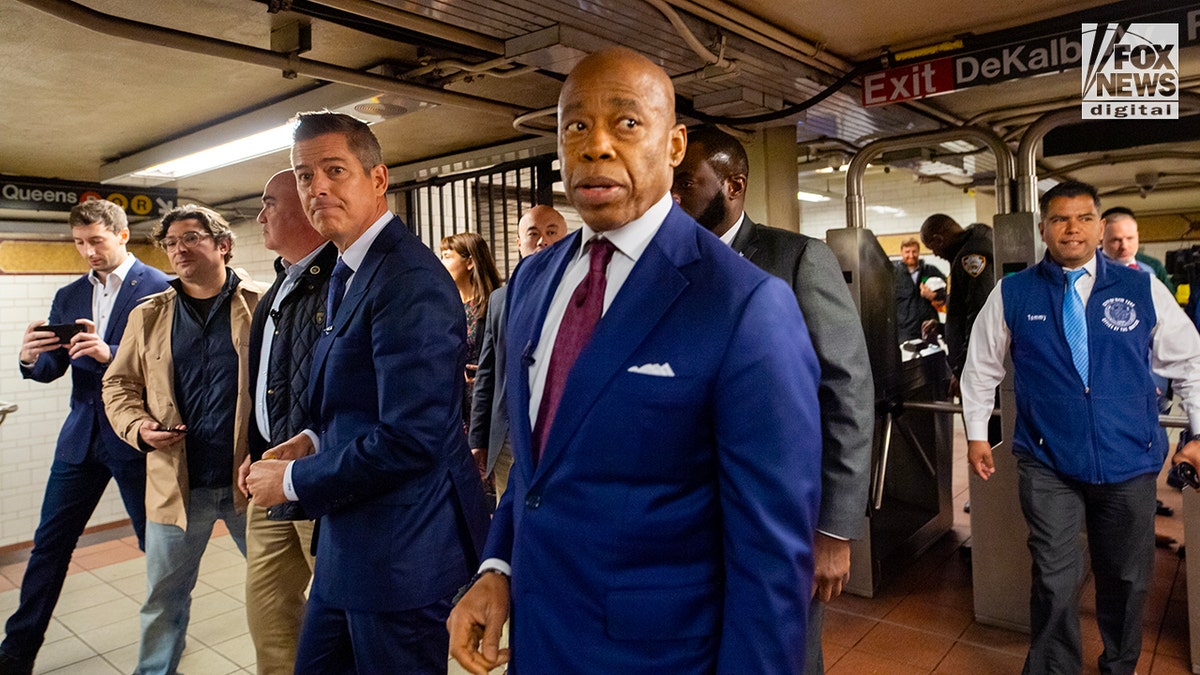 Eric Adams and Sean Duffy on a New York City subway train