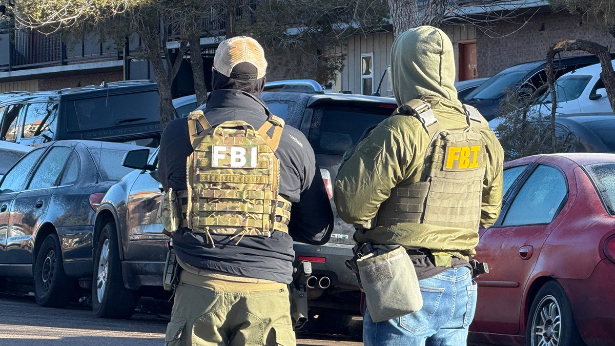 Two FBI agents side-by-side in Denver